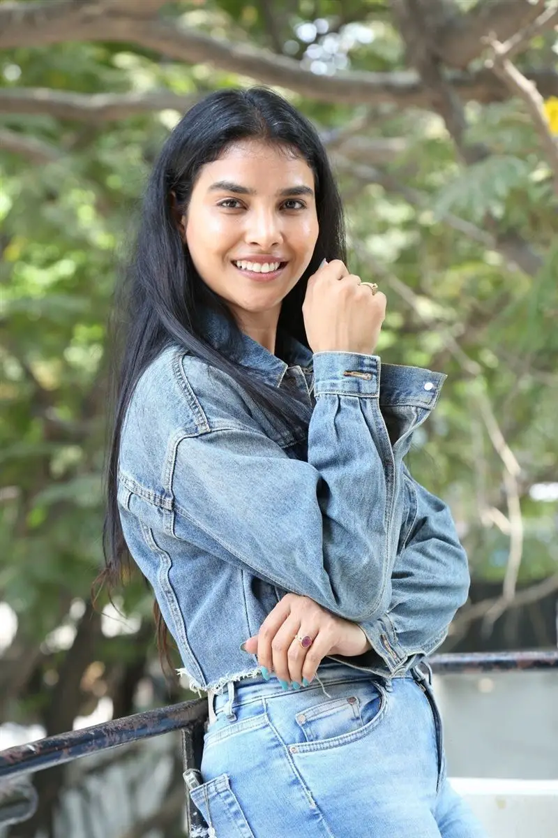 Meenakshi Goswami in Blue Shirt Jeans Pant